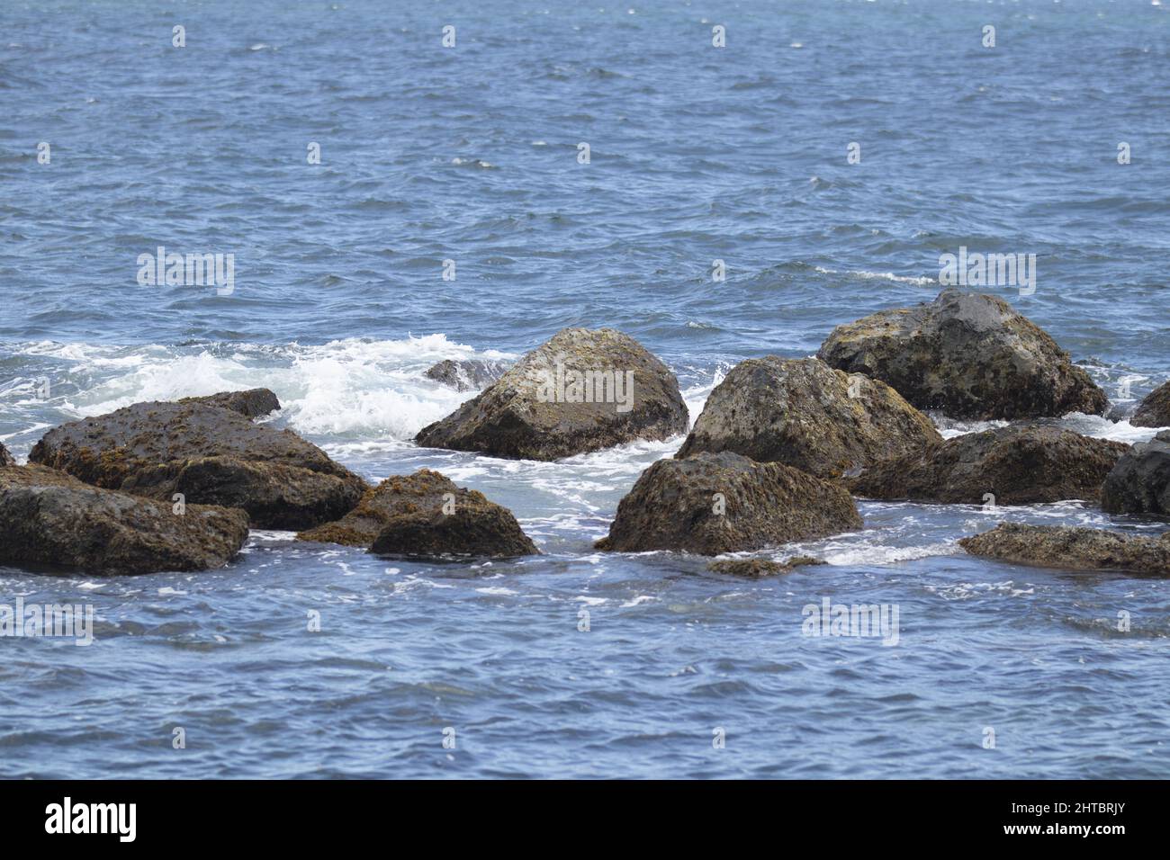 Puerto Rico Rocks Beautiful view of rocks in the sea with splashing waves in Puerto Rico ...