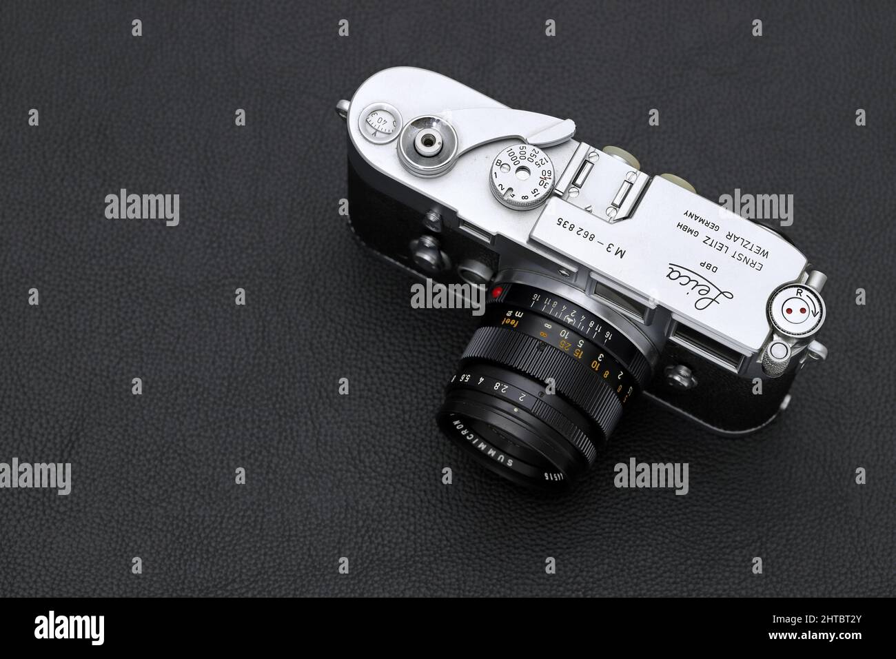 Kagawa, Japan - February 27, 2022: Leica M3 rangefinder camera with Leitz 50mm f2 Summicron M-mount lens. Vintage collectible classic lens concept. Stock Photo