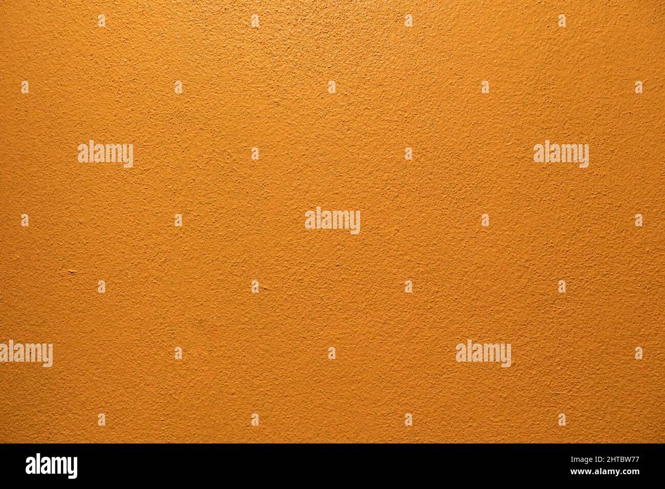 Yellow cement wall for texture and surface background Stock Photo