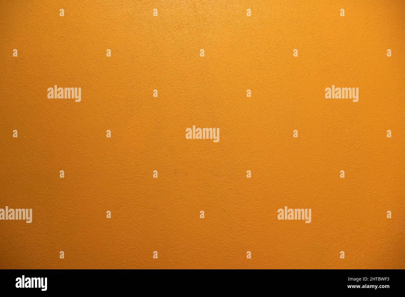 Yellow cement wall for texture and surface background Stock Photo