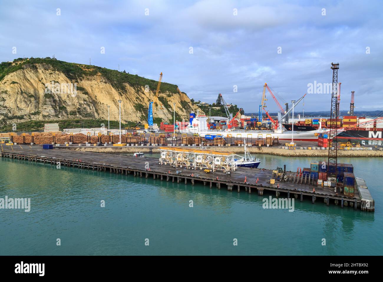 The Port of Napier, Napier, New Zealand, with cargo vessels tied up at the wharves Stock Photo