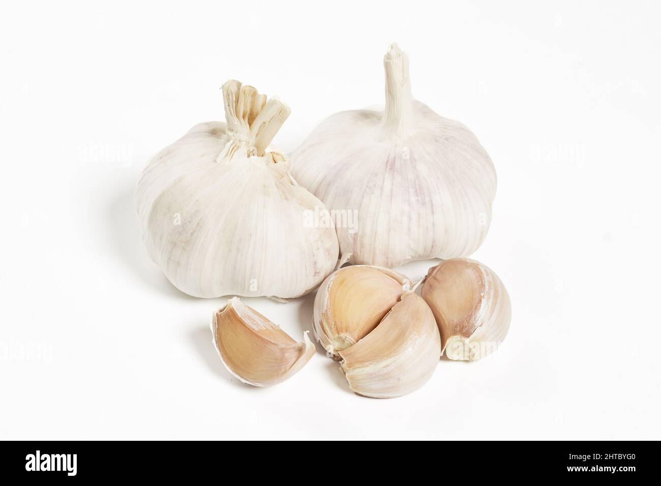 Garlic isolated on a white background with copy space Stock Photo - Alamy
