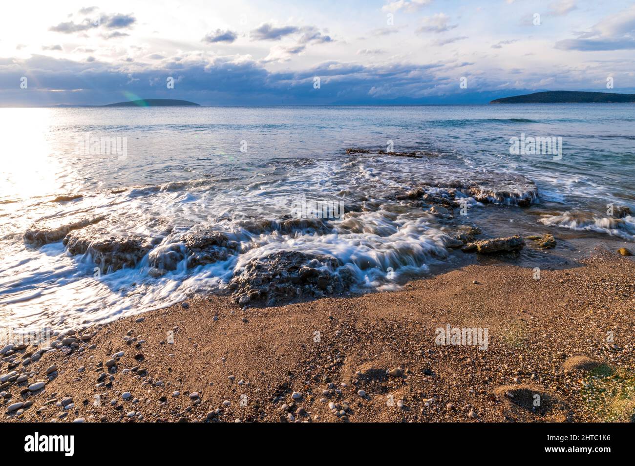Waves splashing on the shore Stock Photo - Alamy