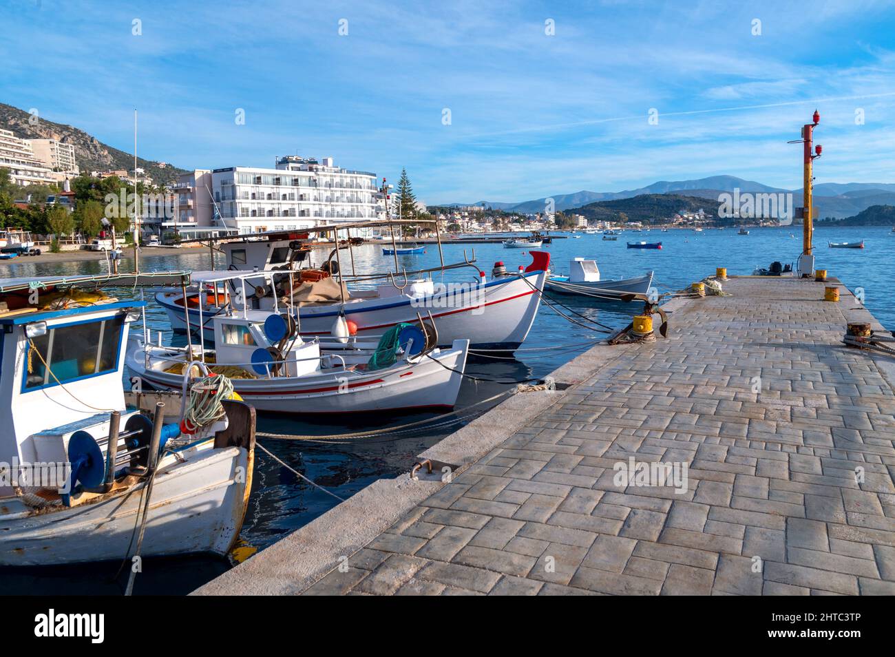 Traditional fishing boats in Tolo, Greece Stock Photo