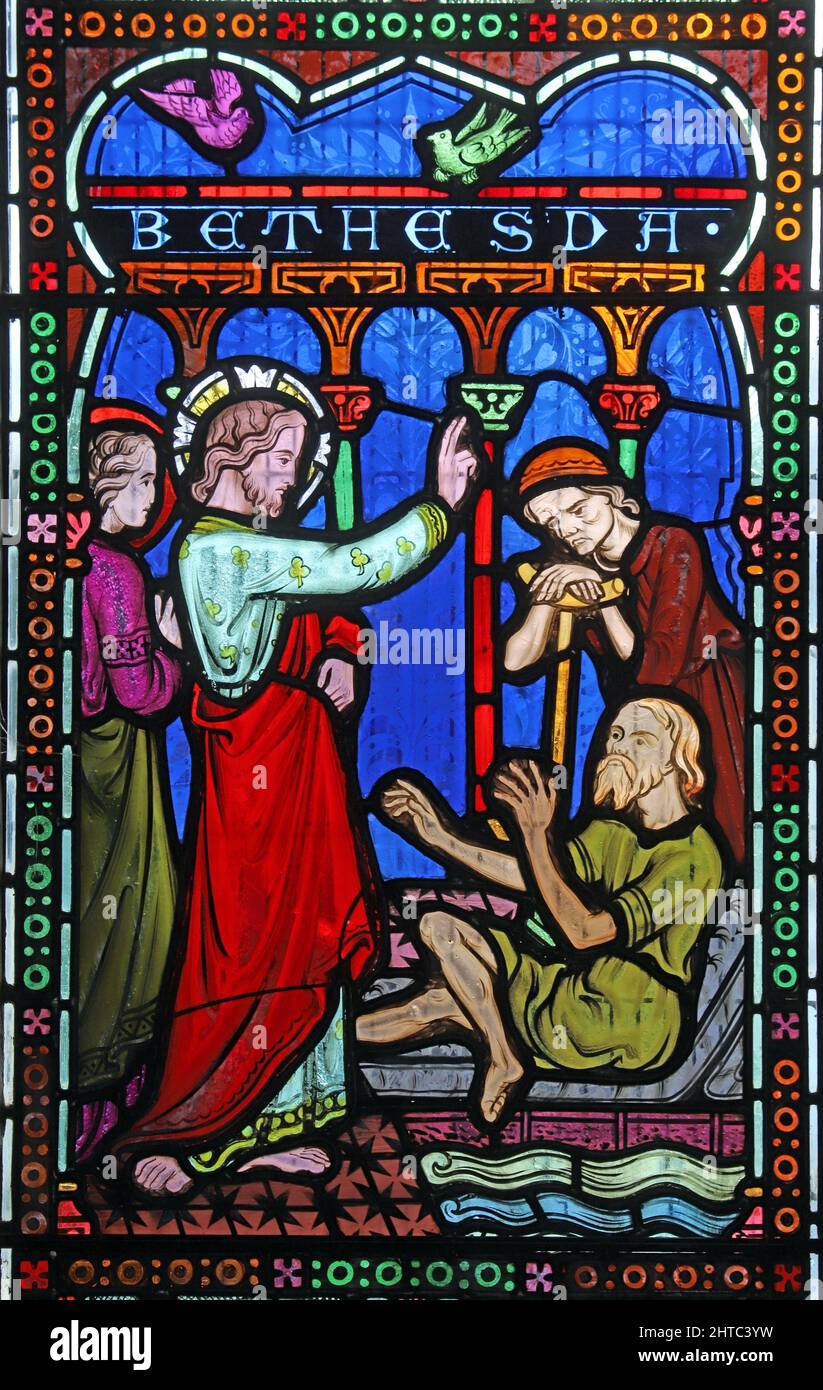 Stained glass window by Frederick Preedy depicting Christ Healing a Cripple at Bethesda. St Lawrence Church, Stretton Grandison, Herefordshire Stock Photo