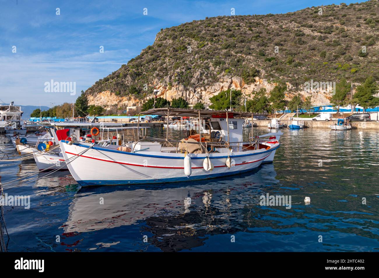 Traditional fishing boats in Tolo, Greece Stock Photo