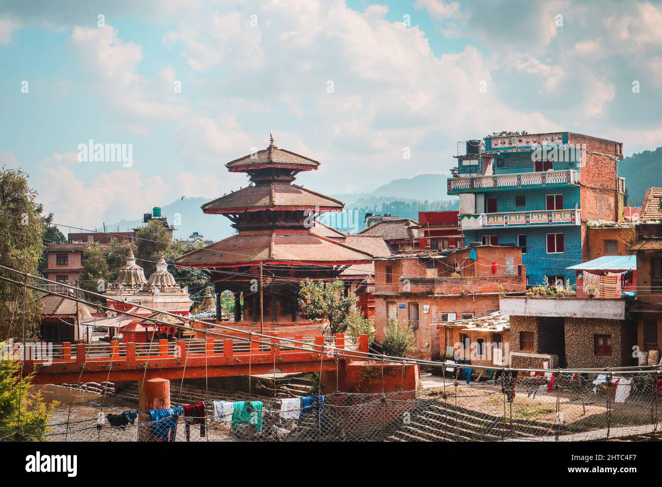 view onto the river and temple complex in Panauti, a beautiful newari village just outside of the Kathmandu Valley in Nepal Stock Photo