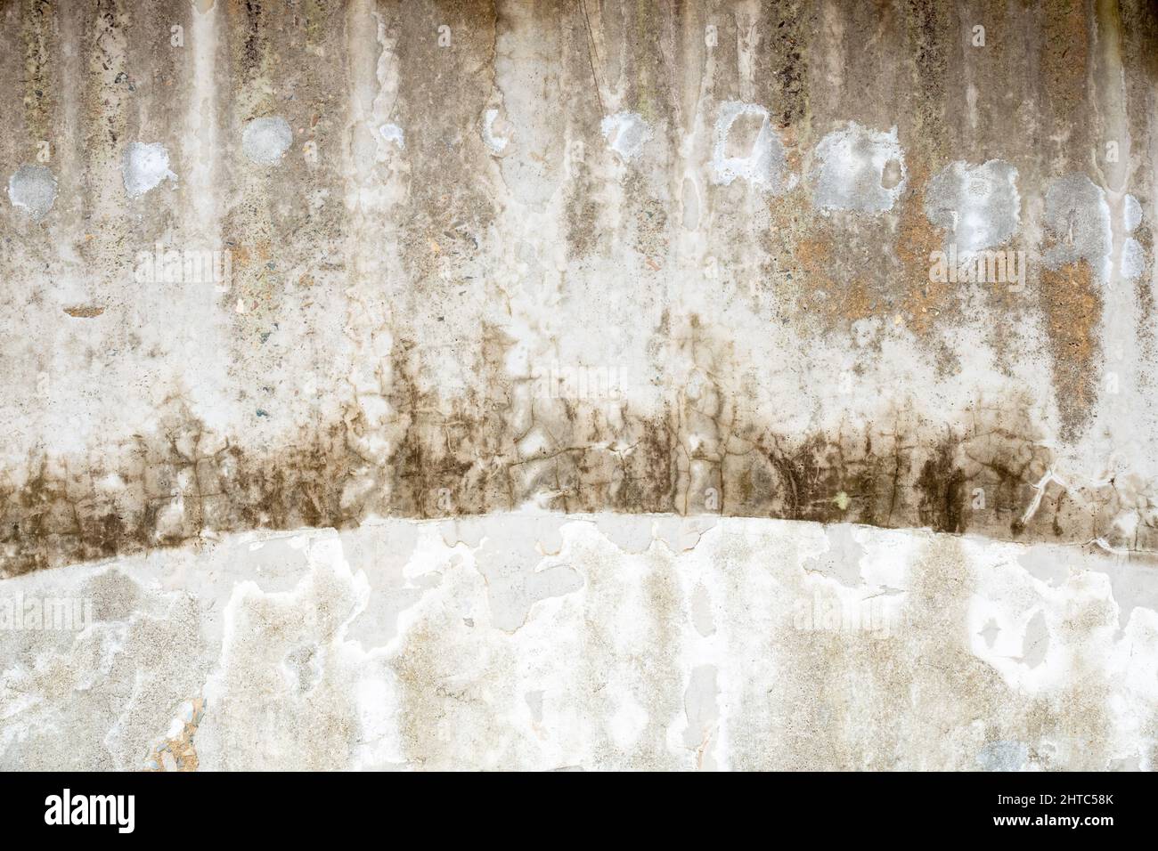 Closeup of an old rough dirty concrete wall for textures and overlays