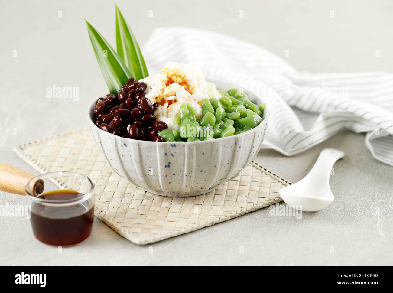 Malaysian Desserts Called Cendol .Cendol is Made From Crushed Ice Cubes, Red Bean, variety of sweets and fruits. Stock Photo