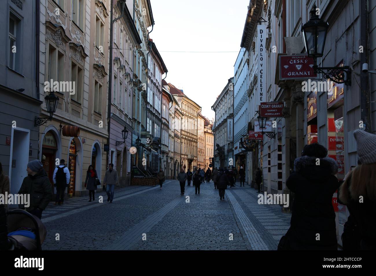 Beautiful view of a street with urban modern shops with arch doors in Prague, Czech Republic Stock Photo