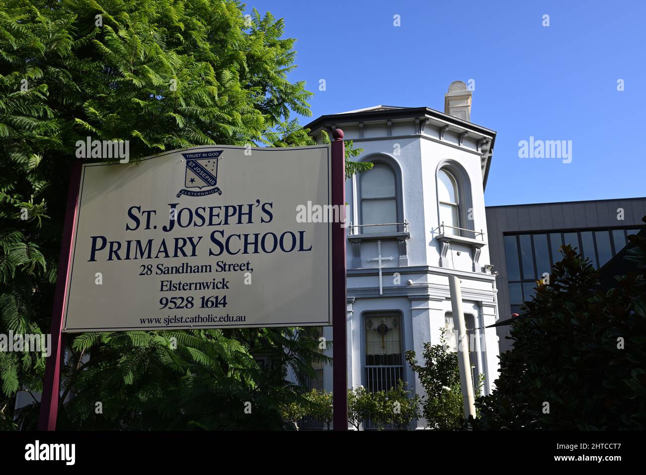 Sign in front of St Joseph's Primary School on Sandham St, with large