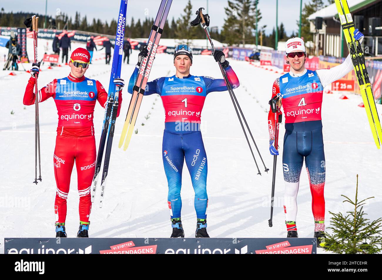 Lygna 20220226.Denis Filimonov from Russia (left) in second place, winner Valerio Grond from Switzerland and Magnus Øyaas Håbrekke from Norway in third place after the final of the 1.2 km sprint free technique for the U-23 World Ski Championships at Lygna. Photo: Terje Pedersen / NTB Stock Photo