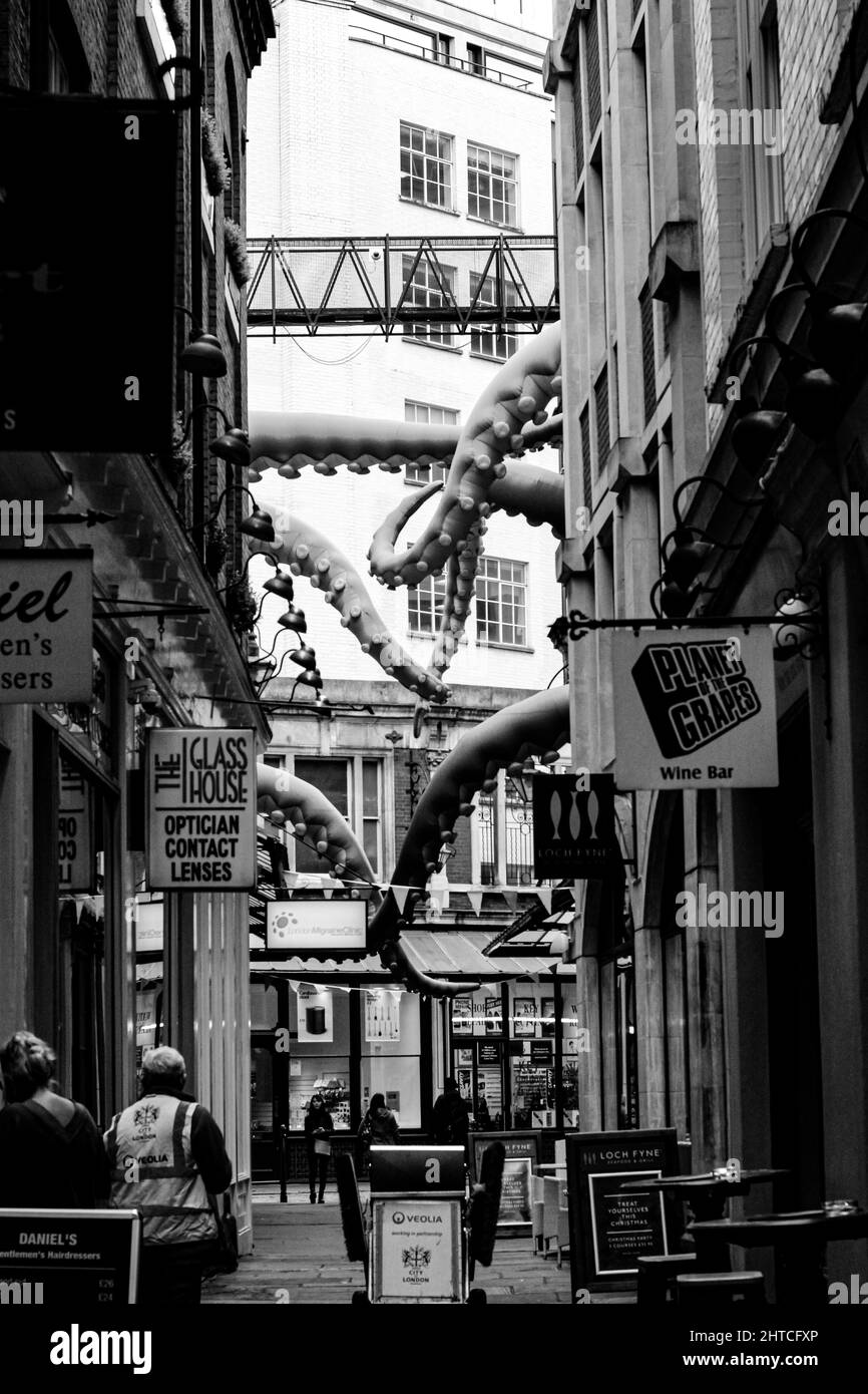 Vertical grayscale shot of a street in Soho district, London, the UK ...