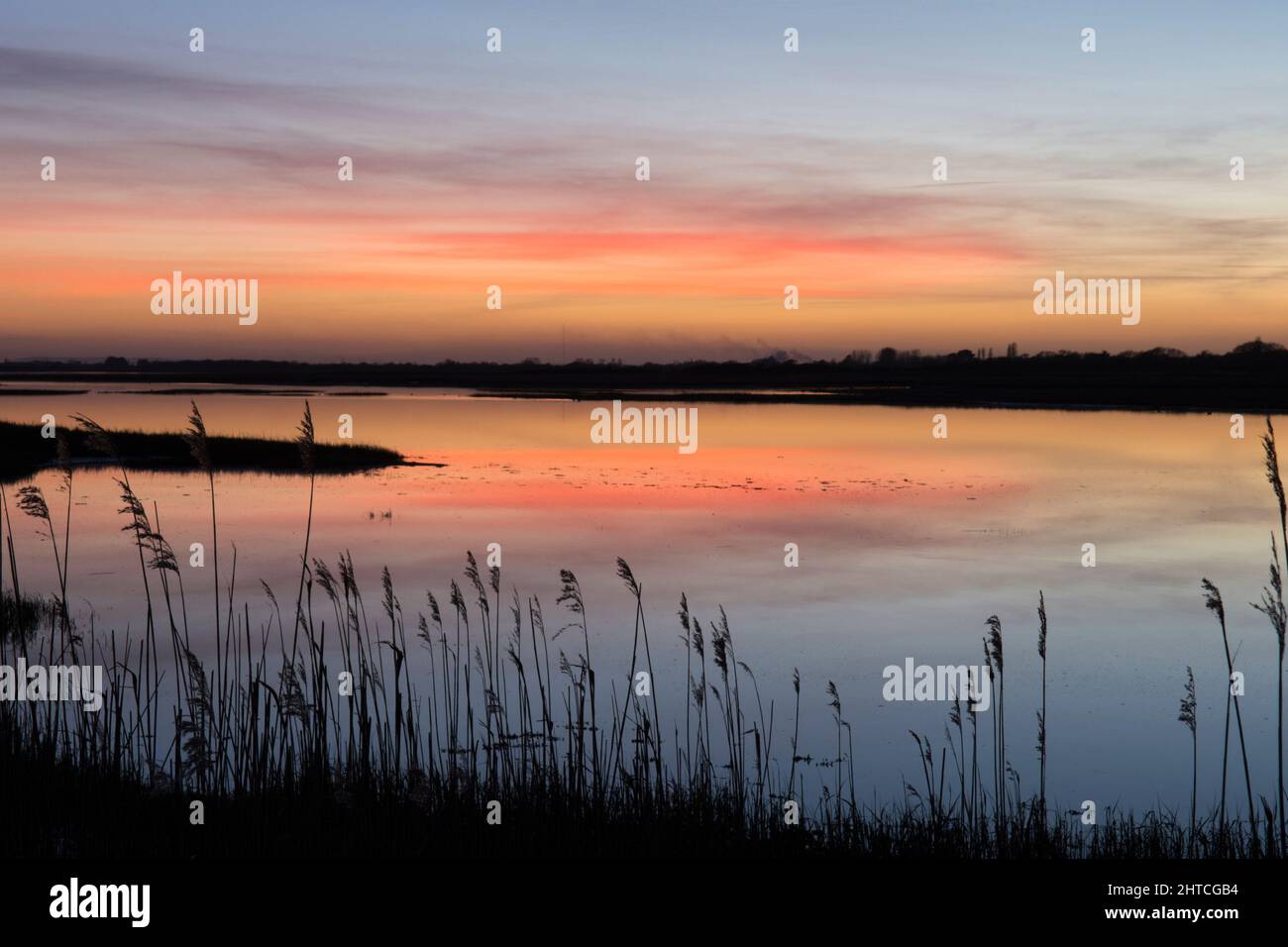 RSPB Pagham Harbour Local Nature Reserve, dusk, twilight, sunset from east shore, winter, January Stock Photo