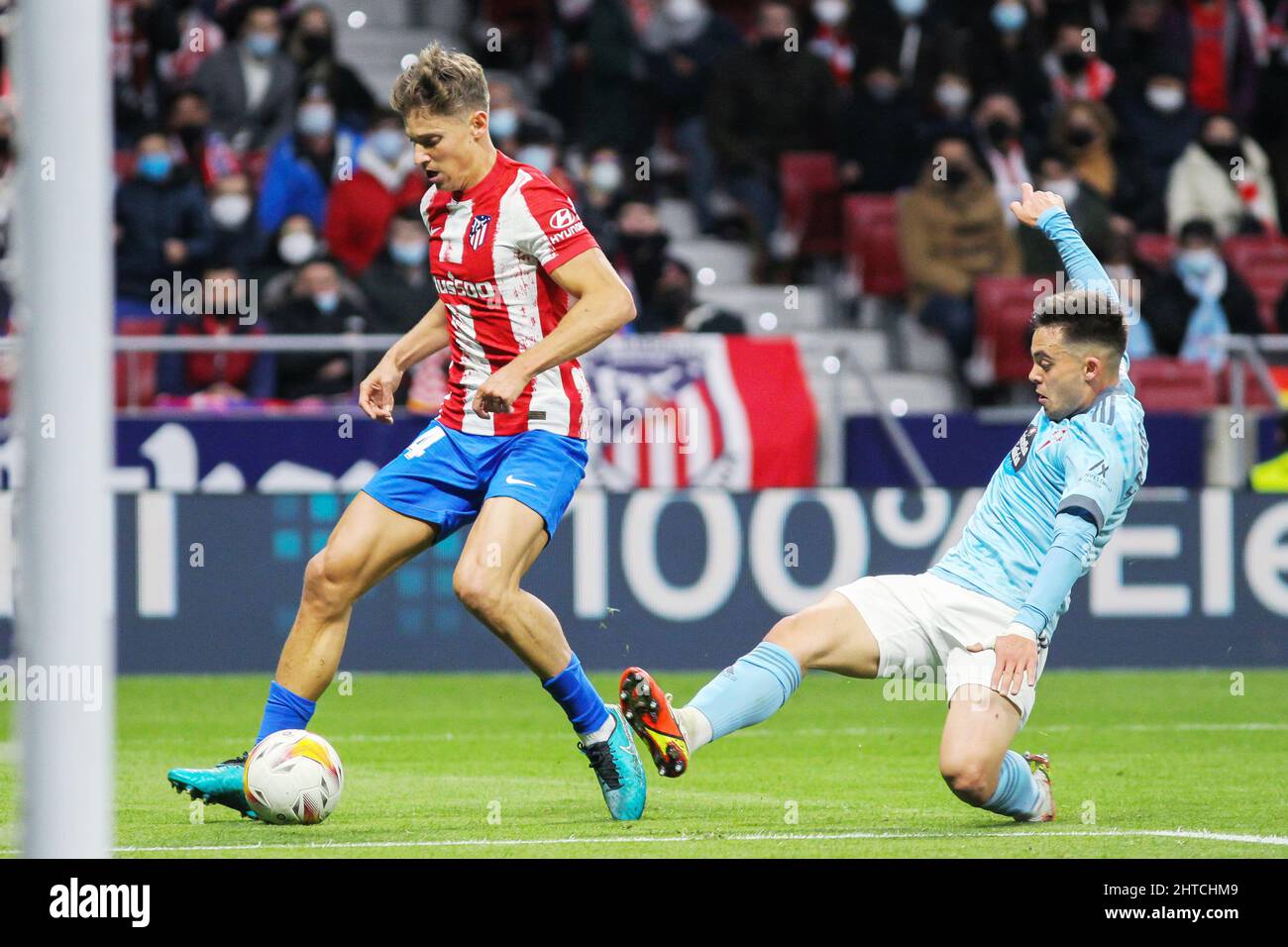 Marcos Llorente of Atletico de Madrid and Fran Beltran of Celta de Vigo during the Spanish championship, La Liga football match between Atletico de Madrid and Celta de Vigo on February 26, 2022 at Wanda Metropolitano stadium in Madrid, Spain - Photo:  Irh/DPPI/LiveMedia Stock Photo