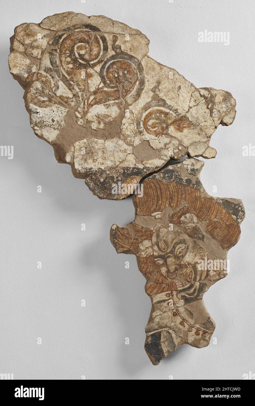 Fragment of a mural with a three-eyed demon with skulls in their hair, 8th-9th century. Found in the Collection of the National Museum of Antiquities of Tajikistan, Dushanbe. Stock Photo