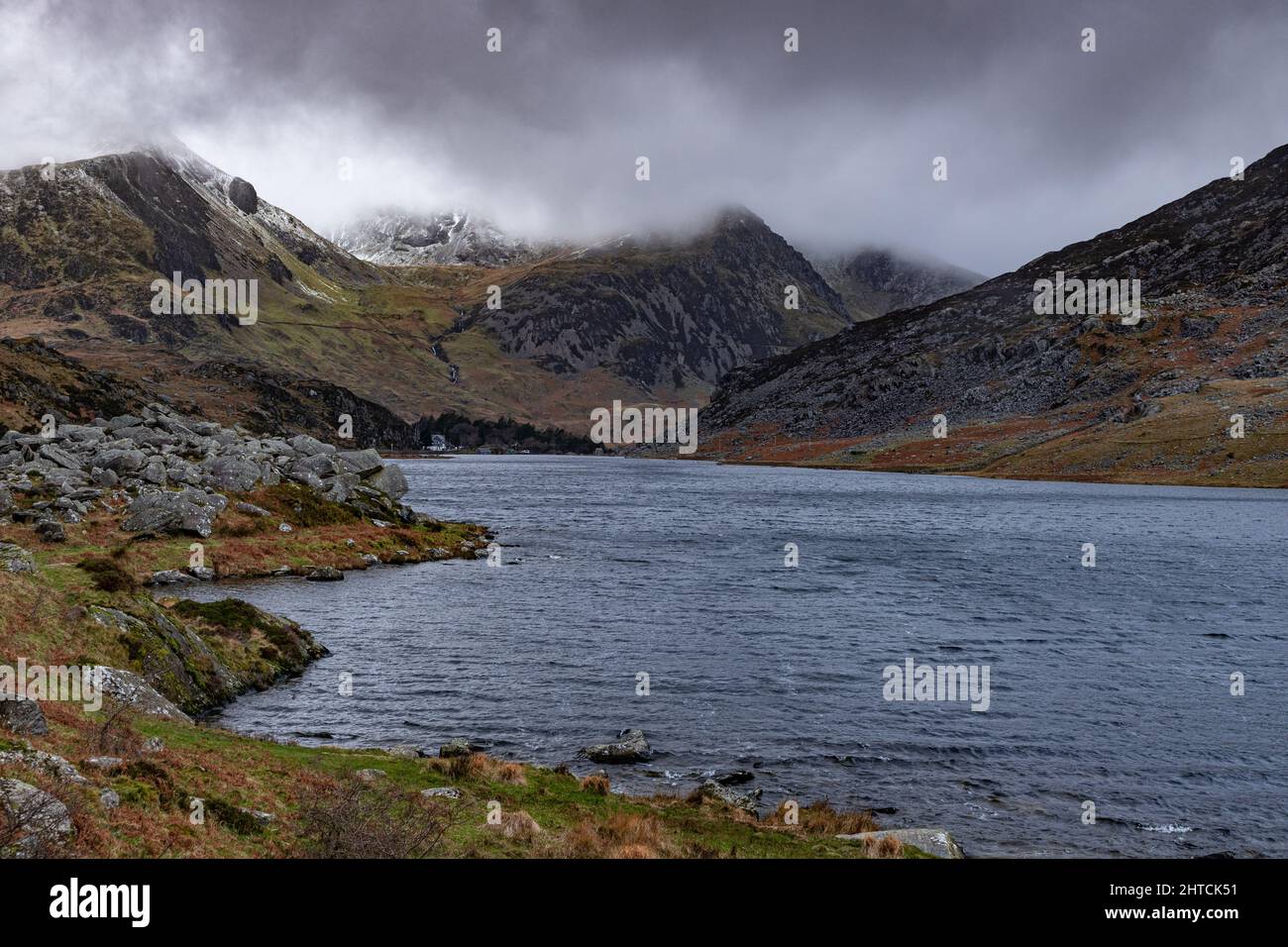 Snow and low cloud on the mountains around Llyn Ogwen, Snowdonia, North Wales Stock Photo