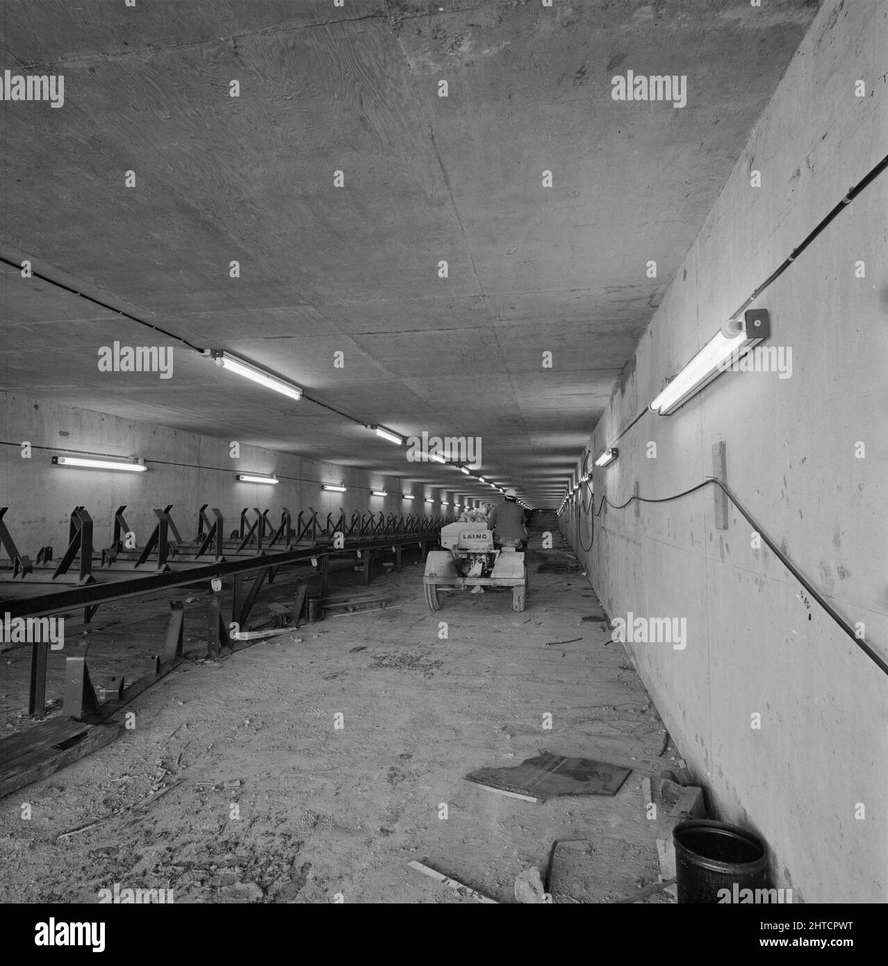 Steel Works, Redcar and Cleveland, North Yorkshire, 16/09/1975. A conveyor belt under construction in a tunnel at the British Steel Works at Redcar. The first phase of Laing's involvement at the Redcar site consisted mostly of the construction of facilities for the reception and storage of raw materials, raw ore, coal and limestone.  A network of tunnels was constructed underground to move these raw materials to the stockyard once delivered by rail. Stock Photo