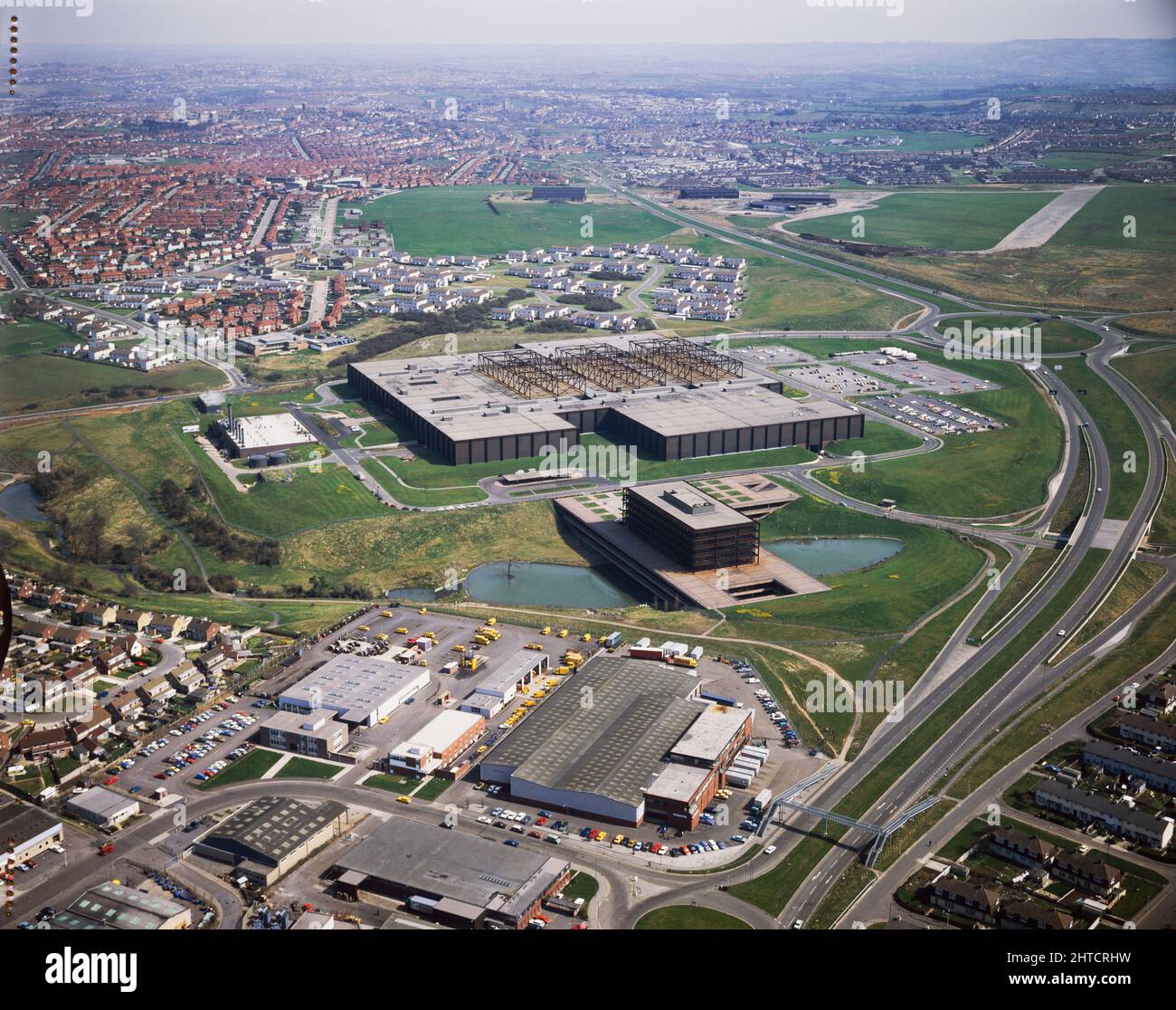 parking tobacco factory WD and HO Wills, Whitchurch Lane, City of Bristol, 01/06/1978. An oblique  aerial view of the Wills tobacco factory at Hartcliffe, Bristol, from the  north west, showing both the factory building itself