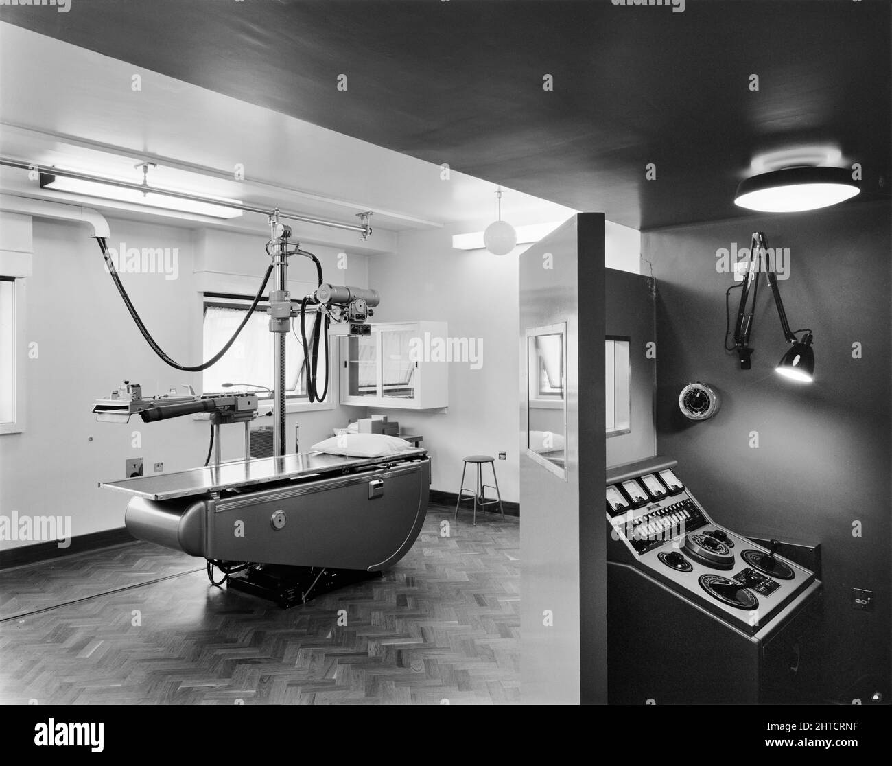 West Cumberland Hospital, Homewood Road, Homewood, Whitehaven, Copeland, Cumbria, 27/08/1964. An x-ray room in the radiography department at West Cumberland Hospital showing the control booth. This photograph appeared in the December 1964 issue of Team Spirit, the Laing company newsletter. Stock Photo