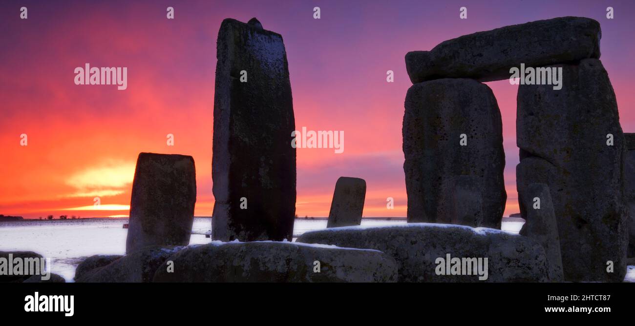 Stonehenge, Stonehenge Down, Amesbury, Wiltshire, 2010. General view of some of the stones of Stonehenge silhouetted against the red sky at sunset. A version of this digital image edited for publication also exists, as PLB N081236.tif. Stock Photo