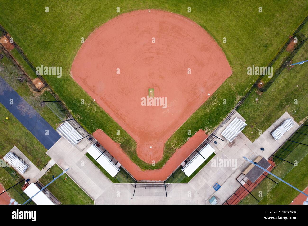 An aerial view of a baseball field with other surrounding fields and