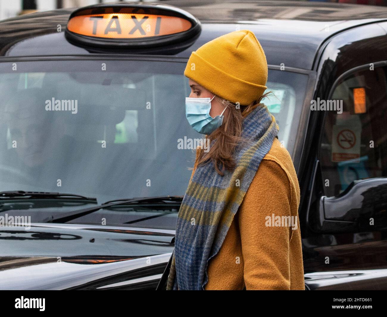 28/02/2022. London, UK. Masked shoppers are seen on Oxford Street today