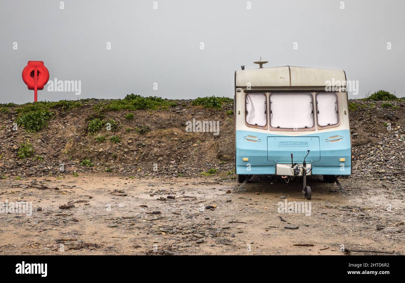 Garrettstown, Cork, Ireland. 28th February, 2022. A vintage caravan parked on a lay-by on a foggy morning at Garrettstown, Co. Cork, Ireland. - Credit; David Creedon / Alamy Live News Stock Photo