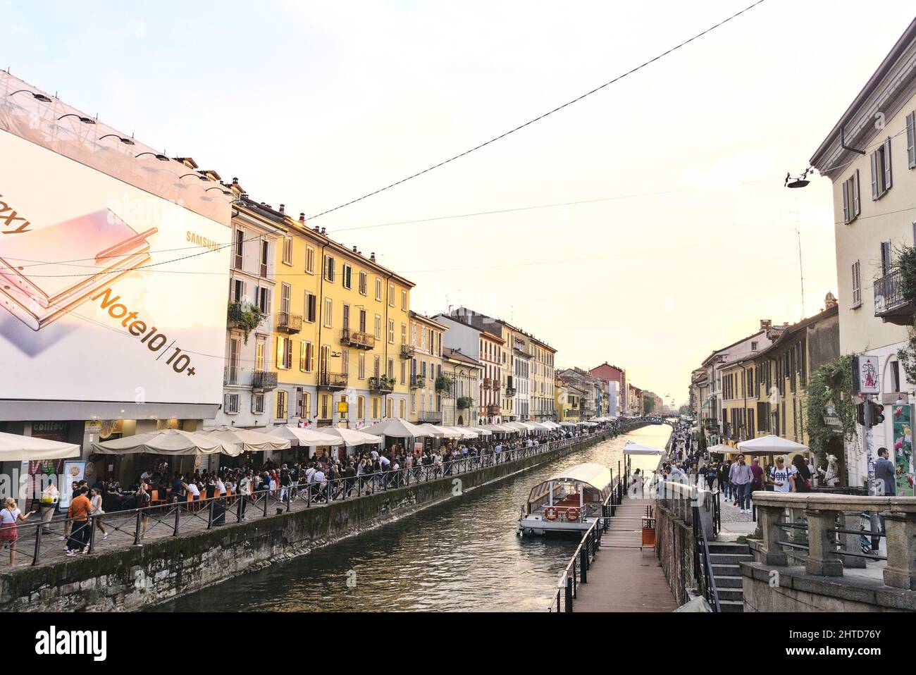 Interconnected canals Navigli with the reflection of buildings in Lombardy, Milan Stock Photo