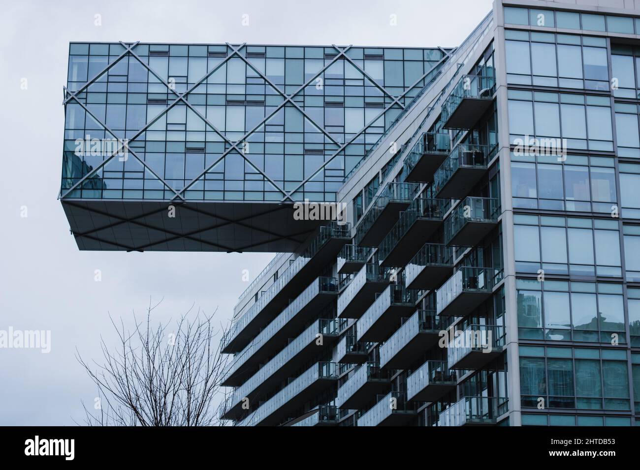 Modern residential building under a cloudy sky Stock Photo - Alamy