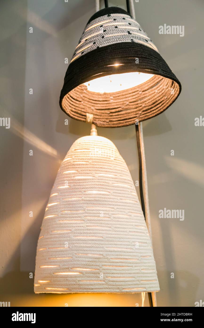 Natural woven pendant light display on a handmade expo Stock Photo