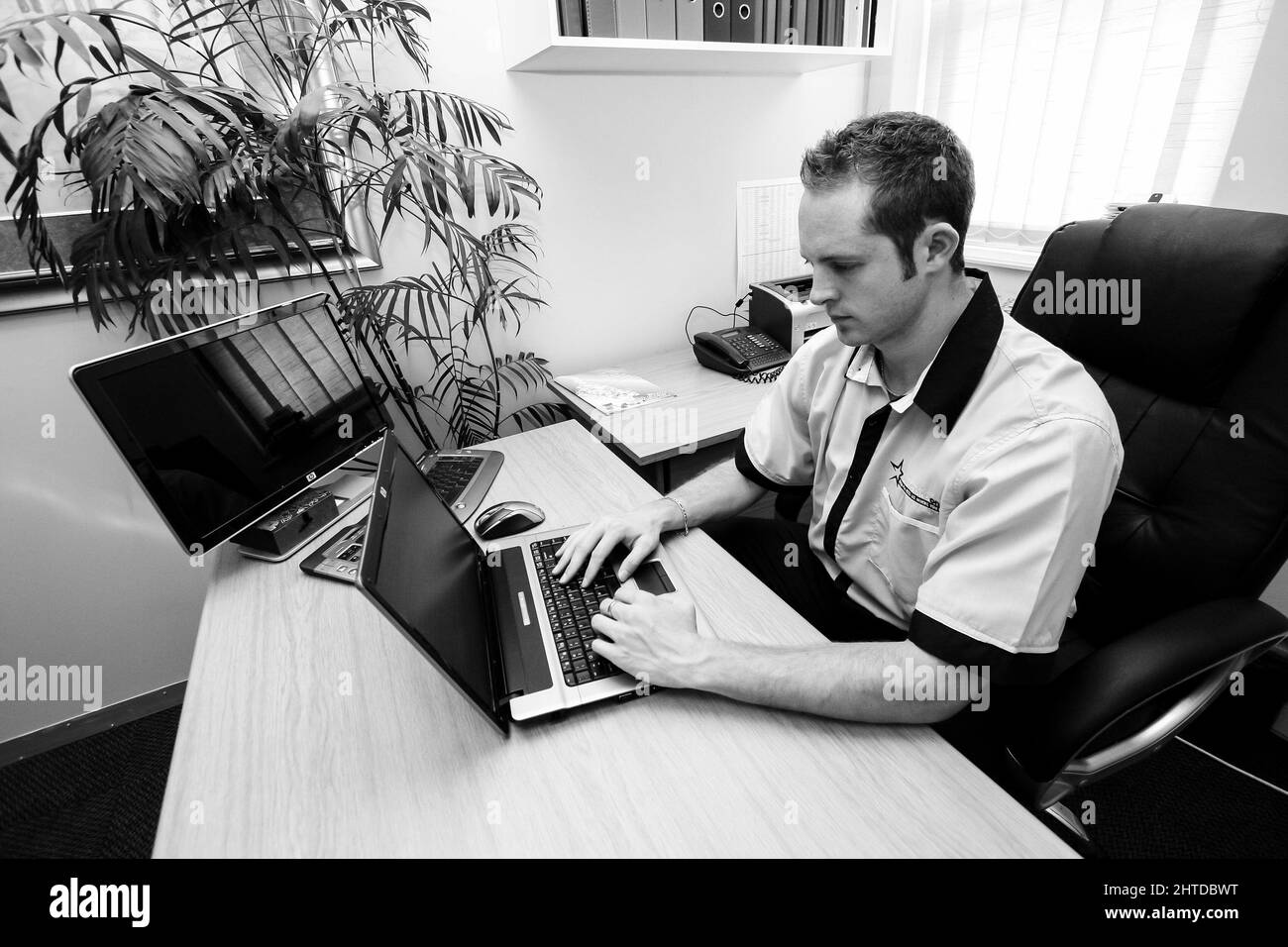 Professional man in office Black and White Stock Photos & Images - Alamy