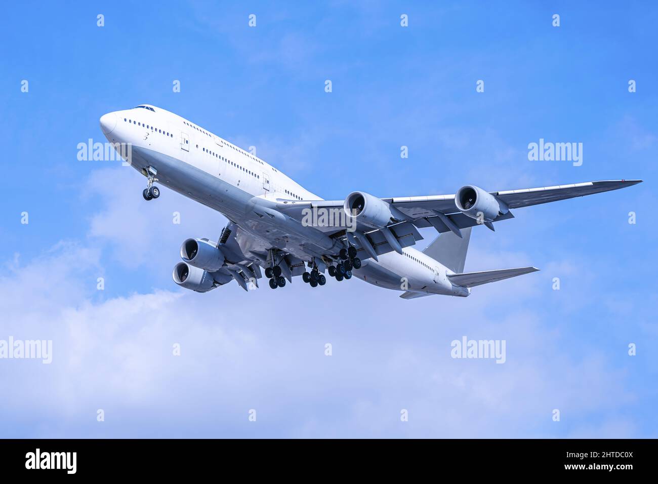 modern airliner in a blue sky Stock Photo