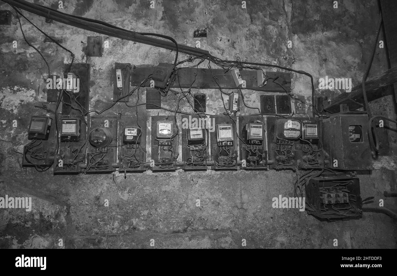 Grayscale shot of aged clocks for measuring electricity Stock Photo Alamy