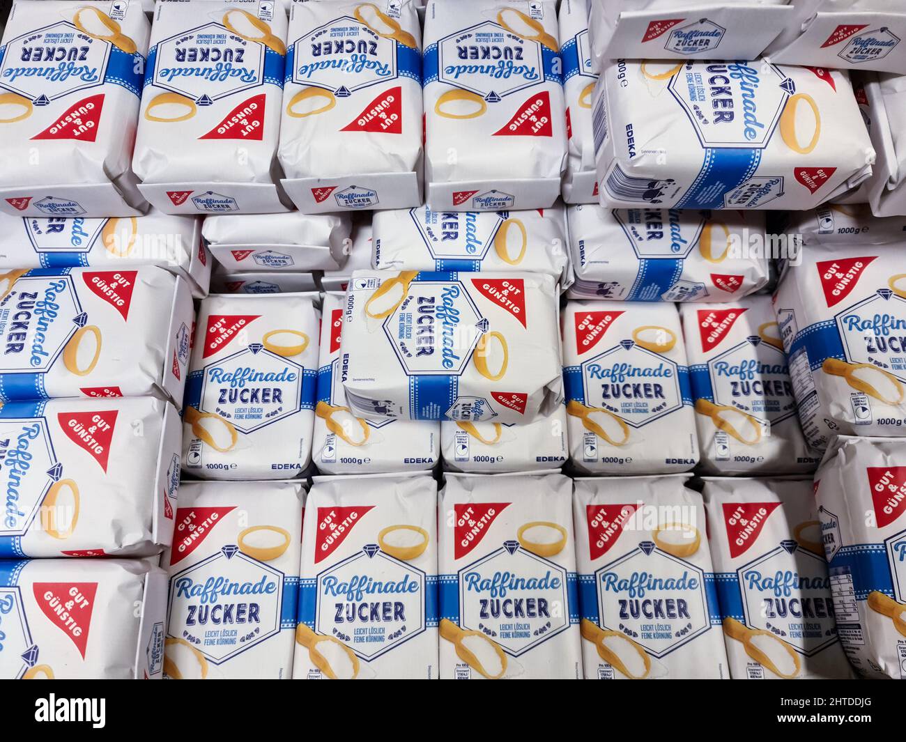 Large pile of house brand Gut & Gunstig sugar in a supermarket for sale Stock Photo