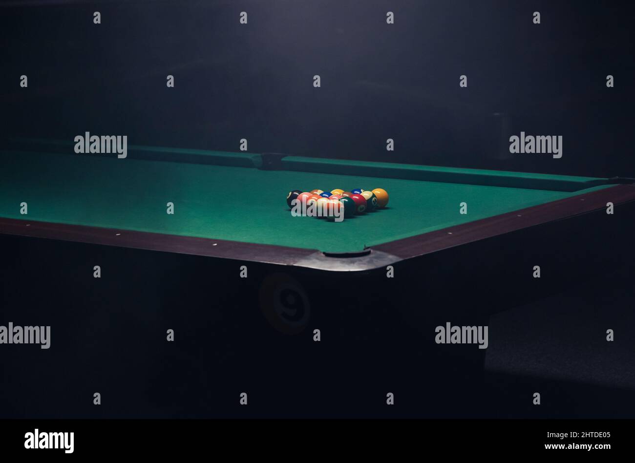 Pool table with green cloth in a bar Stock Photo