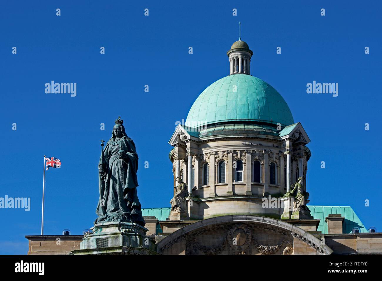 Statue of Queen Victoria and the dome of City Hall, Hull, Humberside