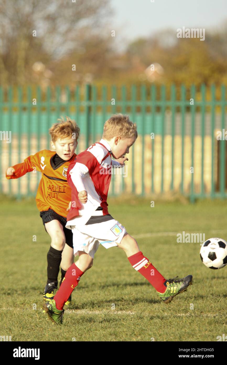 Boys football match between Cleeve Colts U8 and Churchdown Panthers U8 Stock Photo