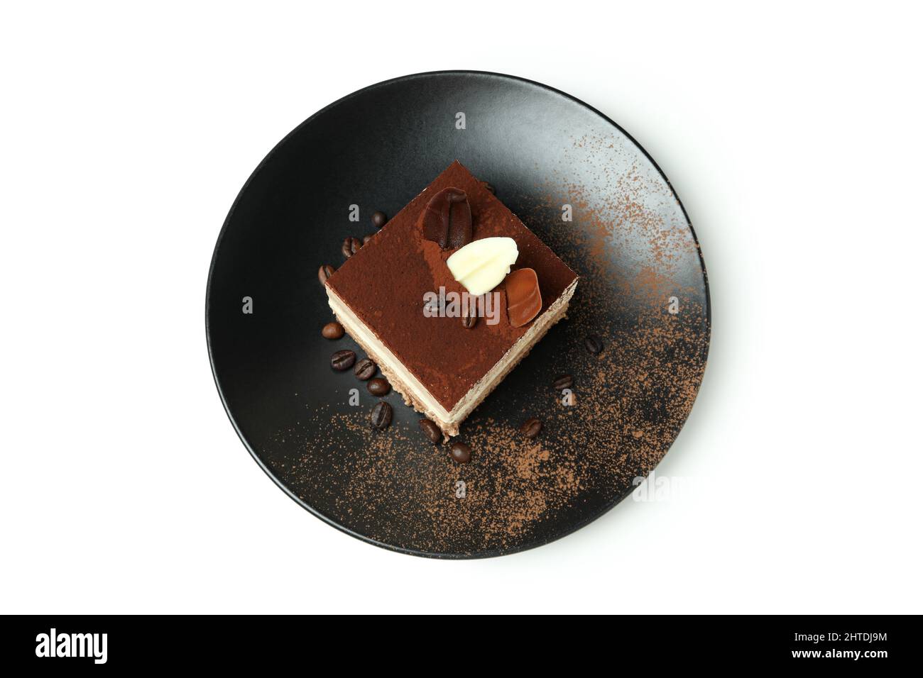 Plate with Tiramisu cake isolated on white background Stock Photo