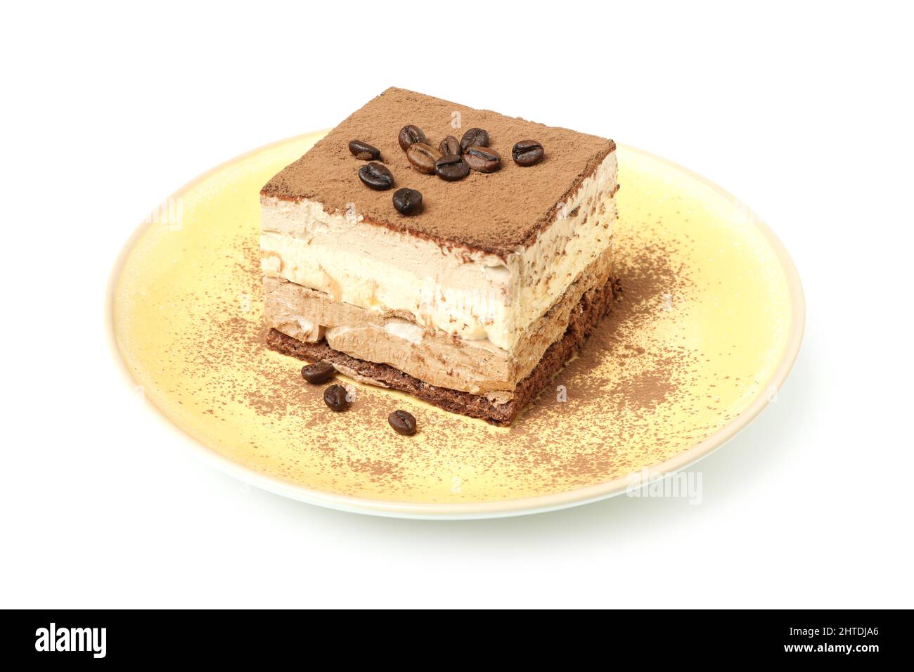 Plate with Tiramisu cake isolated on white background Stock Photo