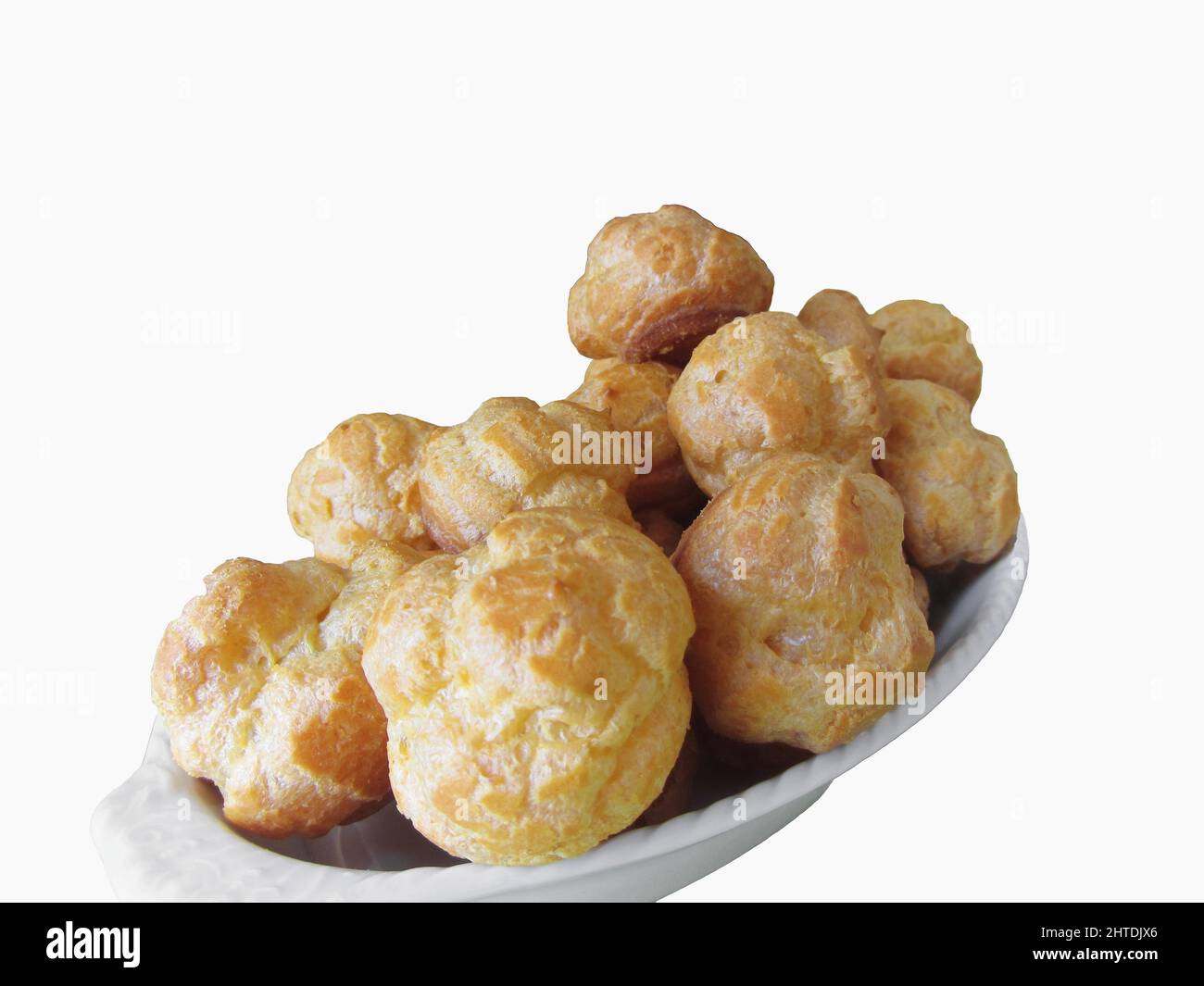 Delicious beignets composed of a shell of choux pastry on white ...