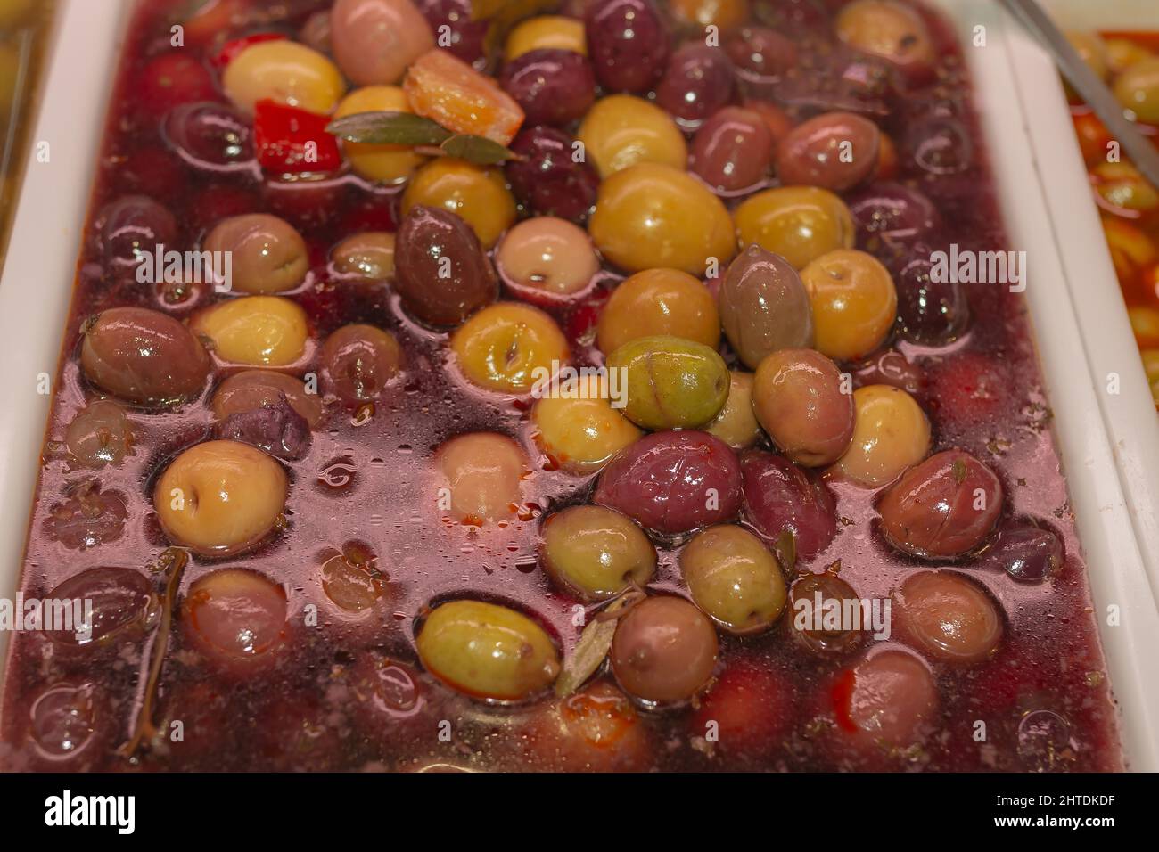 Olives in brine in salt water Stock Photo Alamy