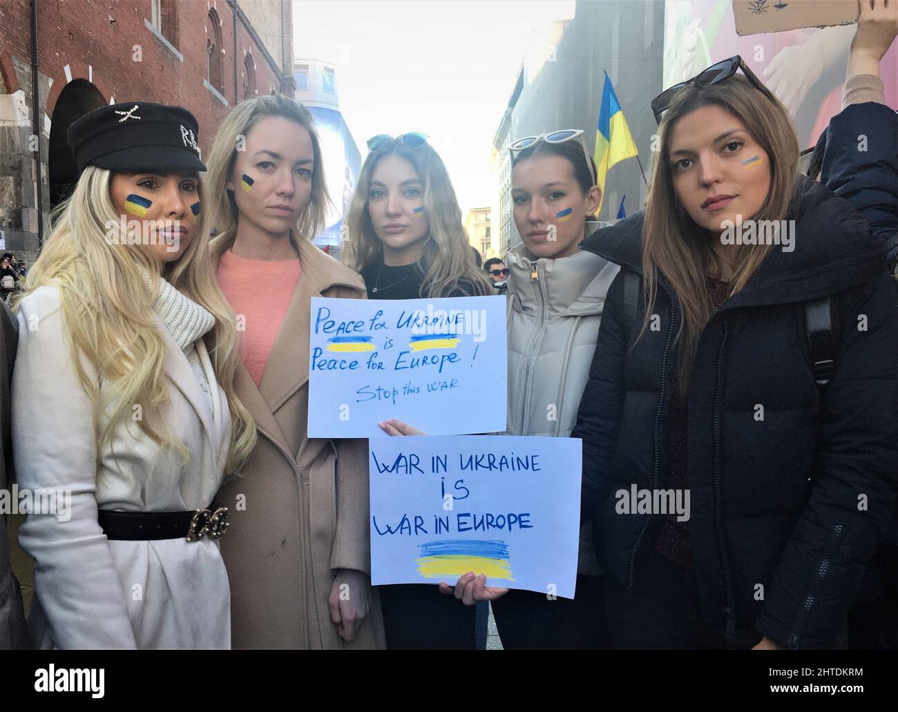 Milan, Italy. 28th Feb, 2022. Milan, Italy in via Mercanti in Milan demonstration organized by the Ukrainian community in support of their country under attack by Russia. In the photo: Ukrainian models living in Milan demonstrate Credit: Independent Photo Agency/Alamy Live News Stock Photo