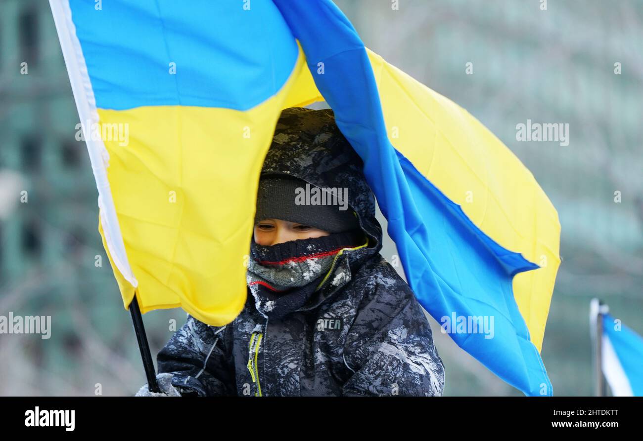 Young boy at the Ukrainian protest against the  Russian invasion in Montreal,Quebec,Canada.Sunday,February.27,2022 Stock Photo
