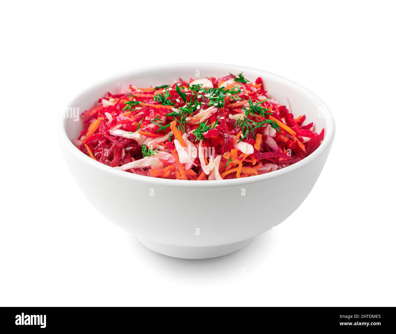 A healthy, vegetable salad with cabbage, carrots and beets is isolated on white. Stock Photo