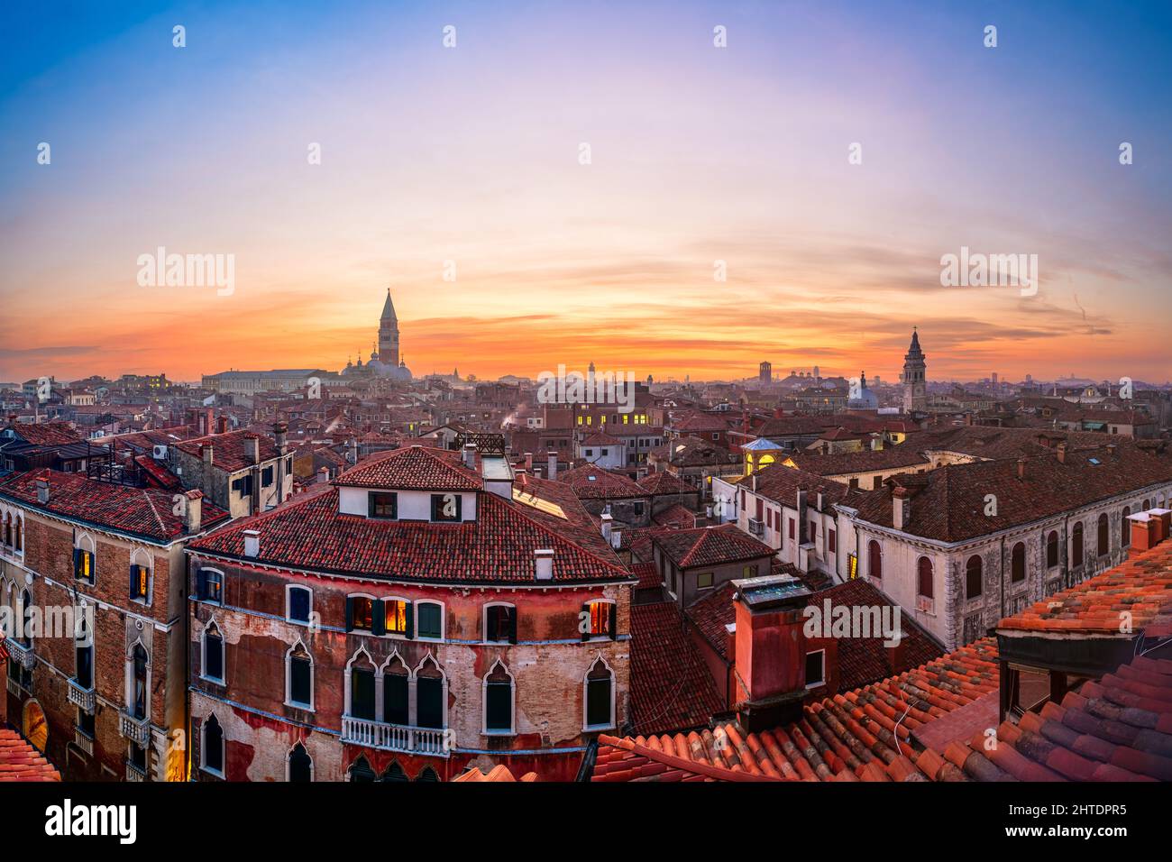 Venice, Italy rooftop skyline and historic landmarks at dusk. Stock Photo