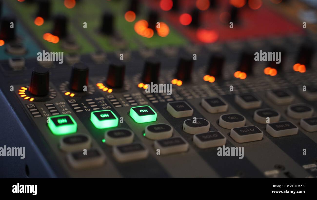 Colored Keys and Green On Keys of Volume Mixer Device Stock Photo - Alamy