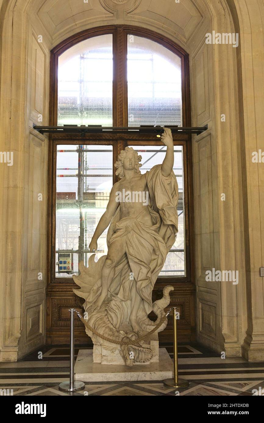 Apollo killing the Python statue at Louvre museum, Paris, France Stock ...