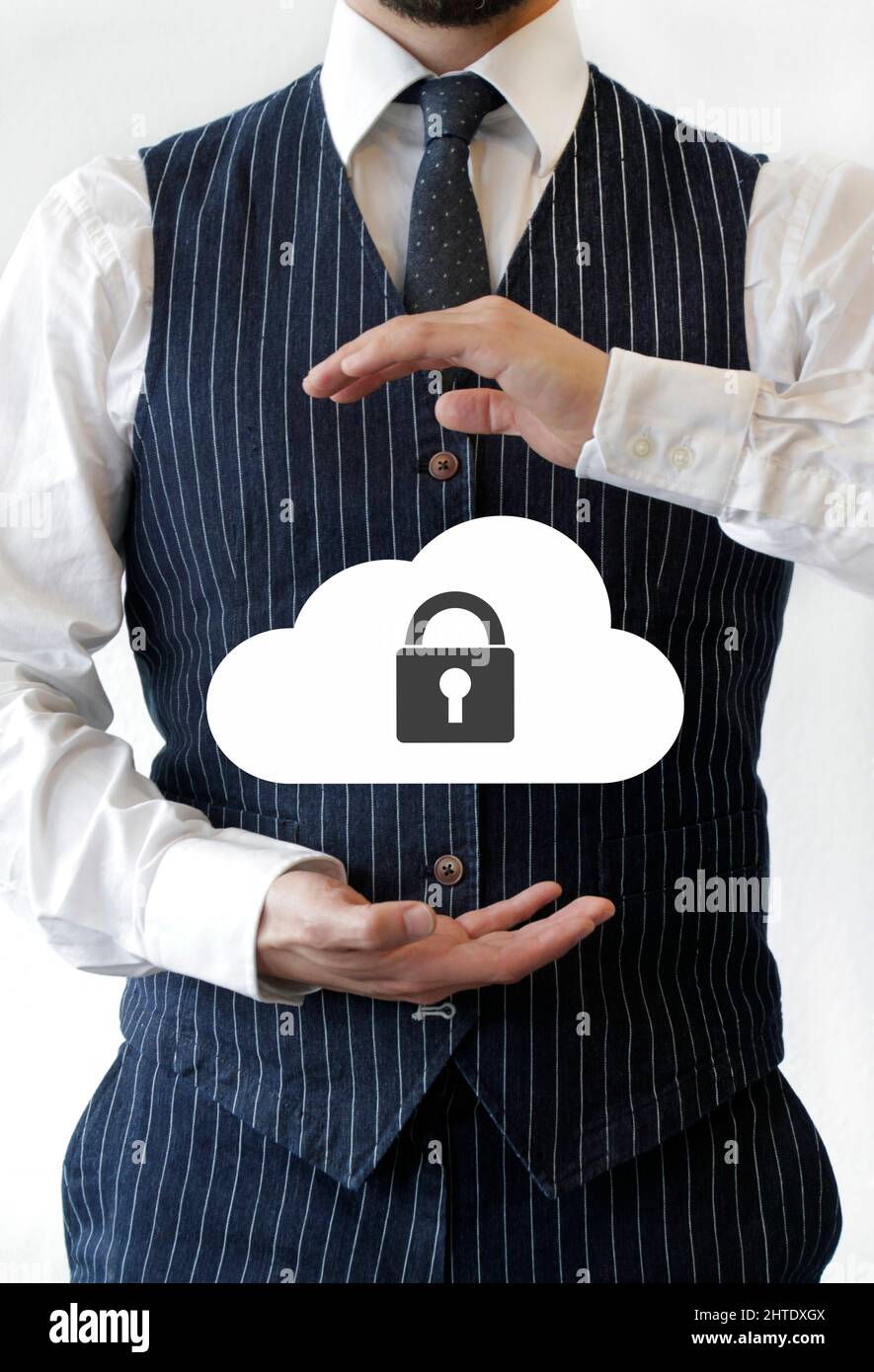 Businessman holding a cloud with a padlock Stock Photo