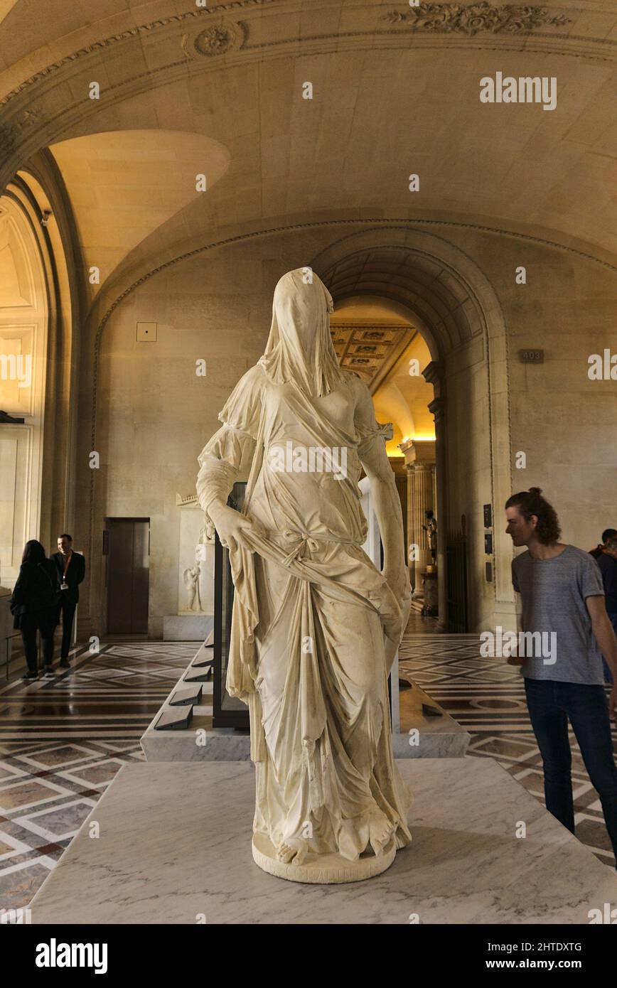 Veiled Woman statue at the Louvre museum, Paris, France Stock Photo - Alamy